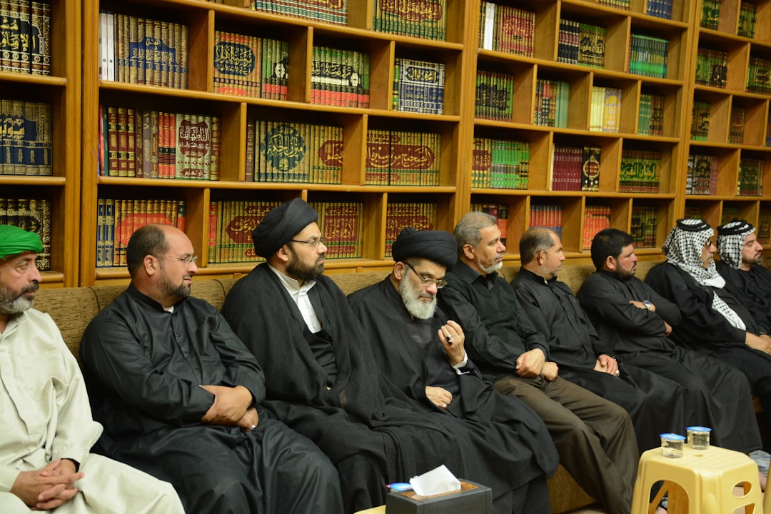 The majlis of Imam Al-Hassan, peace be upon him, in Najaf
Imam Hassan (p.b.u.h) Center for Specialized Studies which is attached by Holy shine of Imam Hussian (p.b.u.h) by Backpack Brands person holding backpack in outdoor setting